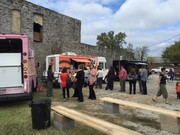 people getting food from food trucks